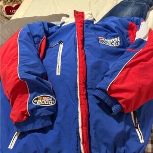 Chase Authentics Blue & Red Racing Puffer It shows wear and some stains.